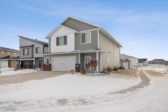 view of front of home featuring driveway and a garage