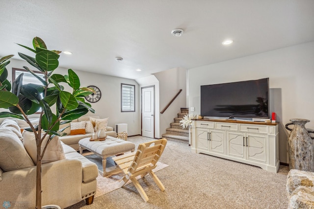 living area featuring light carpet, recessed lighting, stairway, and baseboards