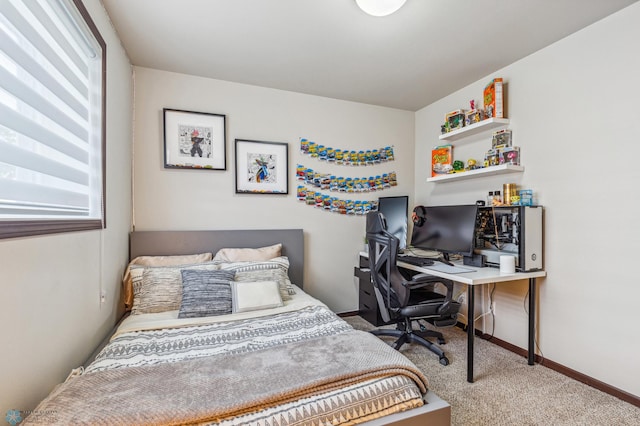 bedroom featuring baseboards and carpet floors