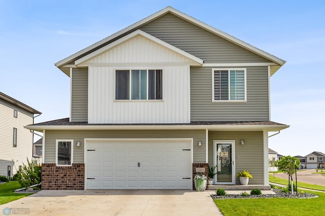 view of front of house featuring concrete driveway, a garage, and brick siding