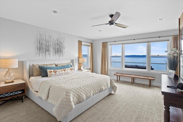 2041 Oak St, Lake City, MN 55041 - carpeted bedroom featuring recessed lighting, a water view, and a ceiling fan