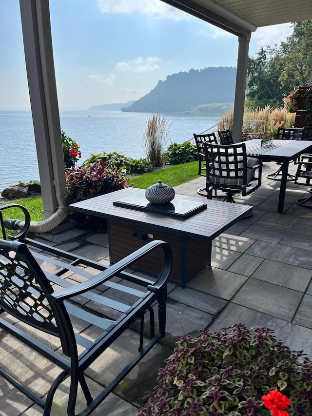 2041 Oak St, Lake City, MN 55041 - view of patio with outdoor dining area and a water view