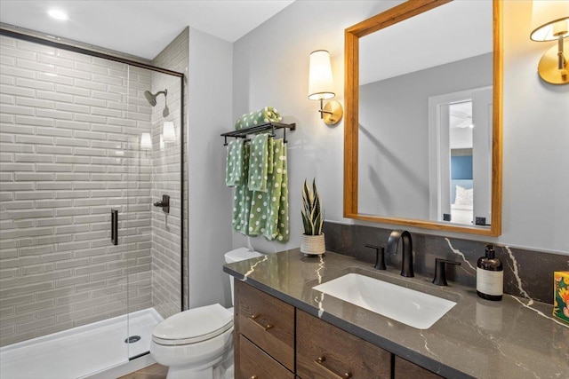 2041 Oak St, Lake City, MN 55041 - bathroom featuring toilet, a stall shower, and vanity