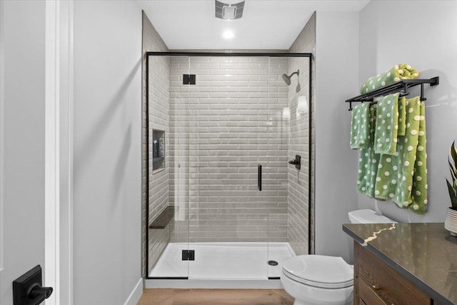 2041 Oak St, Lake City, MN 55041 - full bath featuring toilet, vanity, and a stall shower