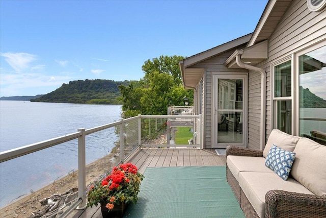 2041 Oak St, Lake City, MN 55041 - wooden deck featuring a water view and an outdoor hangout area