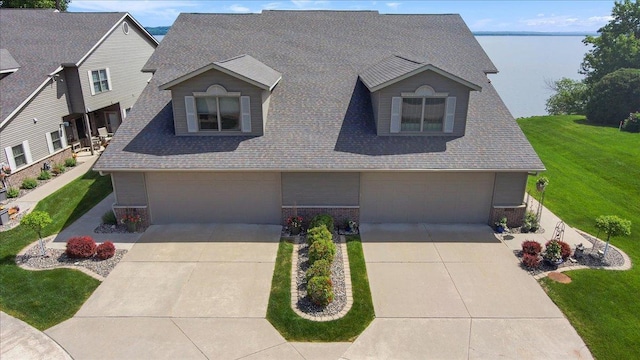 2041 Oak St, Lake City, MN 55041 - craftsman inspired home featuring brick siding, a garage, driveway, and roof with shingles