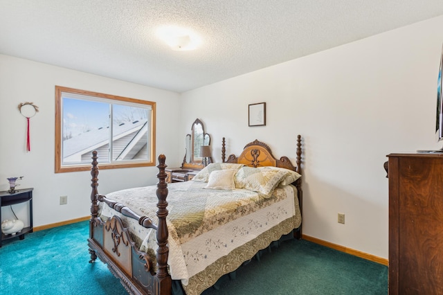 bedroom featuring baseboards, a textured ceiling, and carpet