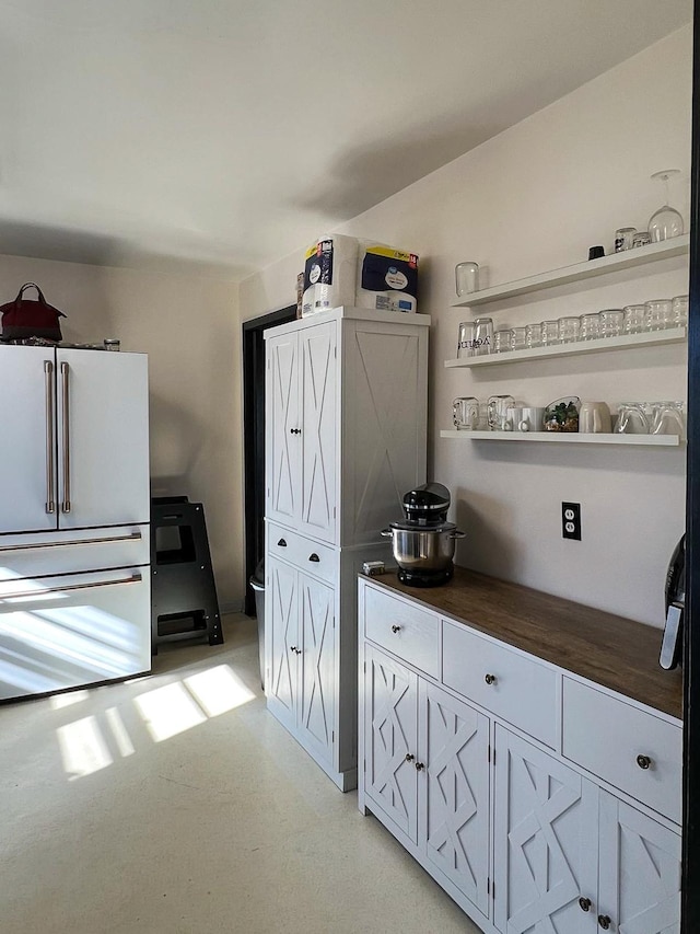 305 Kneale Ave N, Thief River Falls, MN 56701 - kitchen featuring butcher block countertops and freestanding refrigerator