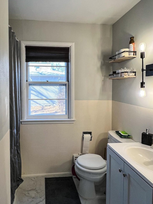 305 Kneale Ave N, Thief River Falls, MN 56701 - bathroom featuring vanity, marble finish floor, and toilet