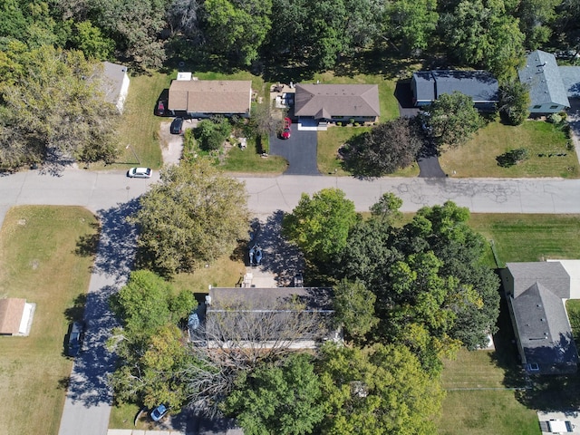 birds eye view of property with a residential view
