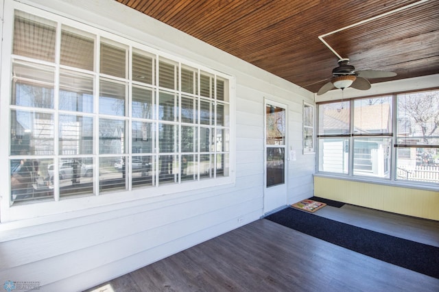 708 1st St N, Fargo, ND 58102 - unfurnished sunroom featuring a ceiling fan and radiator