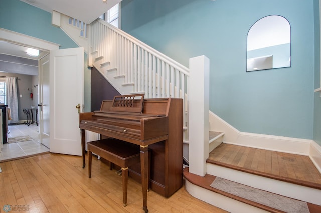 708 1st St N, Fargo, ND 58102 - stairs with wood-type flooring