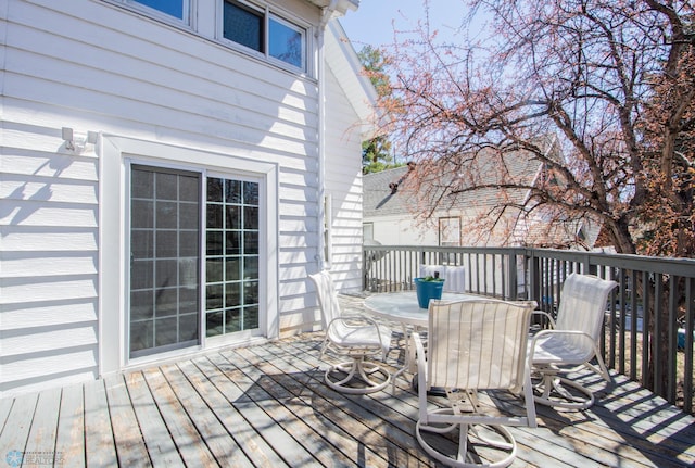 708 1st St N, Fargo, ND 58102 - wooden deck featuring outdoor dining space