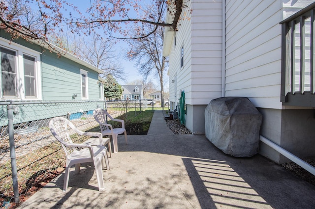 708 1st St N, Fargo, ND 58102 - view of patio with grilling area and fence
