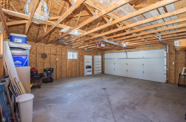 708 1st St N, Fargo, ND 58102 - garage featuring a garage door opener