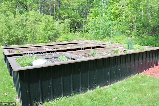 14638 State Highway 70, Pine City, MN 55063 - exterior view of a garden and a heavily wooded area