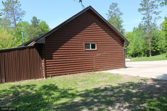 14638 State Highway 70, Pine City, MN 55063 - view of side of property with an outbuilding and faux log siding