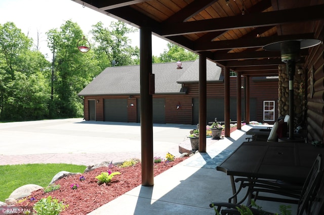 14638 State Highway 70, Pine City, MN 55063 - view of patio with driveway and an attached garage