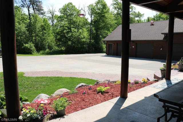 14638 State Highway 70, Pine City, MN 55063 - view of patio / terrace with a garage