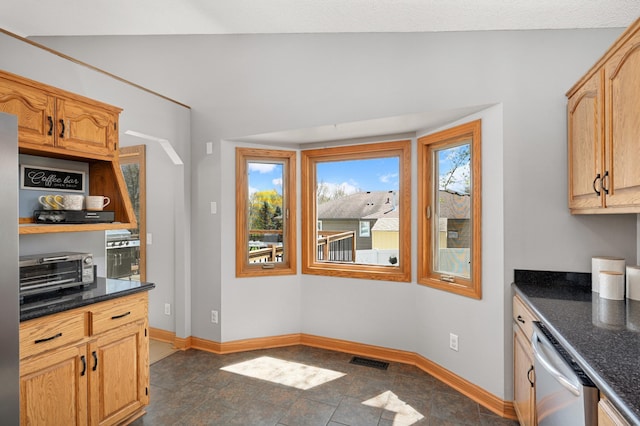 kitchen with baseboards, visible vents, a toaster, and dishwasher