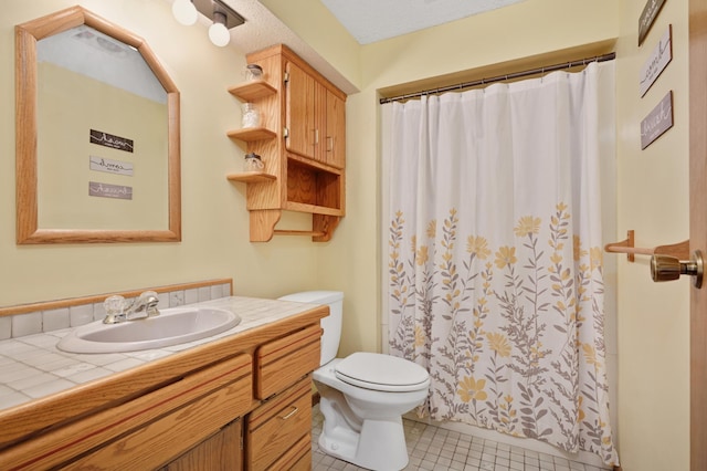 bathroom featuring vanity, tile patterned flooring, toilet, and a shower with shower curtain