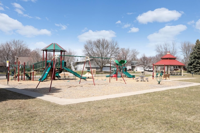 communal playground with a gazebo and a yard