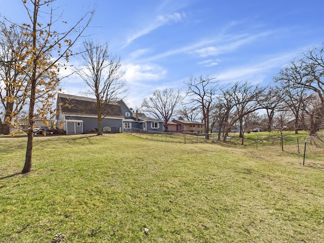 view of yard with fence