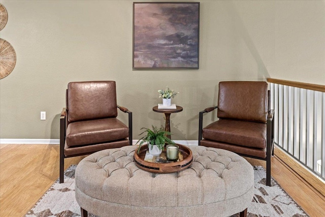 6491 Regency Ln, Eden Prairie, MN 55344 - living area with baseboards and wood finished floors