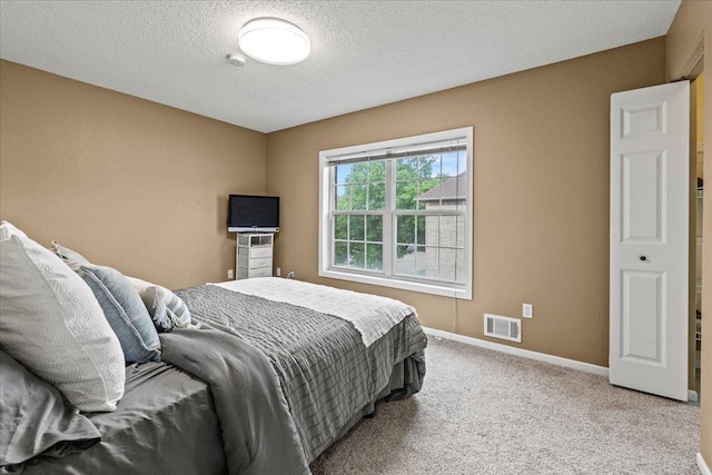 6491 Regency Ln, Eden Prairie, MN 55344 - carpeted bedroom featuring baseboards and a textured ceiling