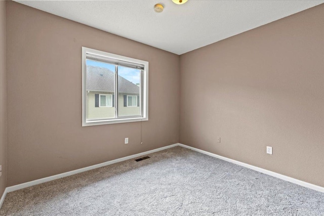 6491 Regency Ln, Eden Prairie, MN 55344 - spare room with carpet floors and a smoke detector