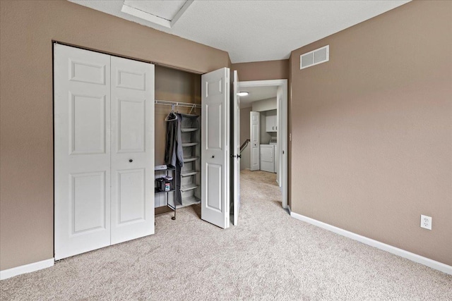 6491 Regency Ln, Eden Prairie, MN 55344 - unfurnished bedroom featuring carpet, a closet, and attic access