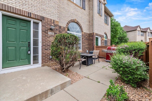 6491 Regency Ln, Eden Prairie, MN 55344 - view of patio with a fire pit
