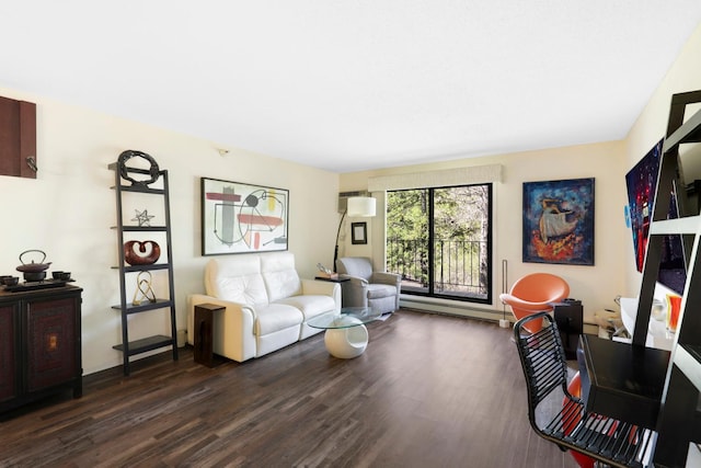 living room with dark wood-style floors and a baseboard radiator