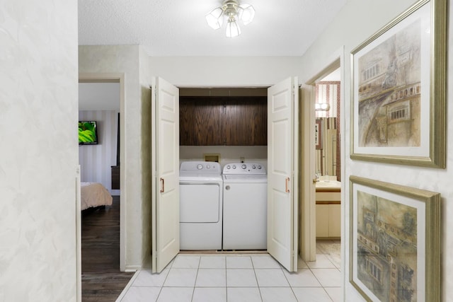 clothes washing area with independent washer and dryer