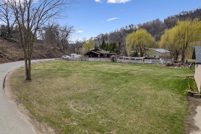 view of yard featuring fence