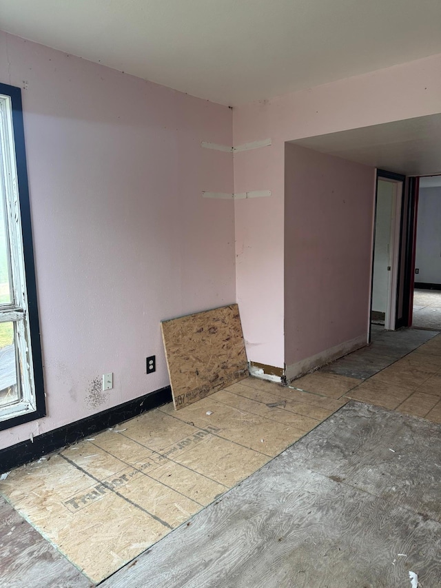 empty room featuring visible vents and baseboards