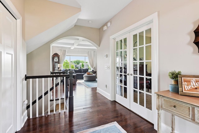 3209 Symphony Ct, Chaska, MN 55318 - hallway featuring french doors, arched walkways, wood finished floors, an upstairs landing, and beamed ceiling