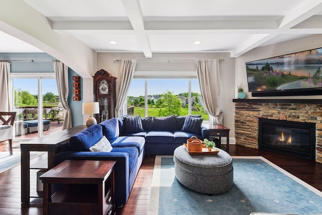 3209 Symphony Ct, Chaska, MN 55318 - living area featuring coffered ceiling, healthy amount of natural light, beamed ceiling, wood finished floors, and a stone fireplace