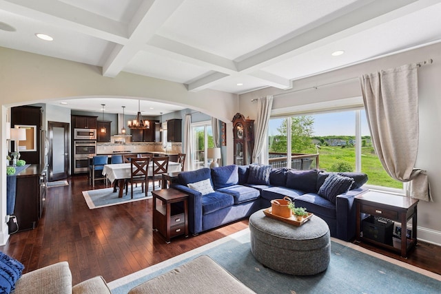 3209 Symphony Ct, Chaska, MN 55318 - living area featuring arched walkways, beamed ceiling, dark wood-style floors, coffered ceiling, and recessed lighting