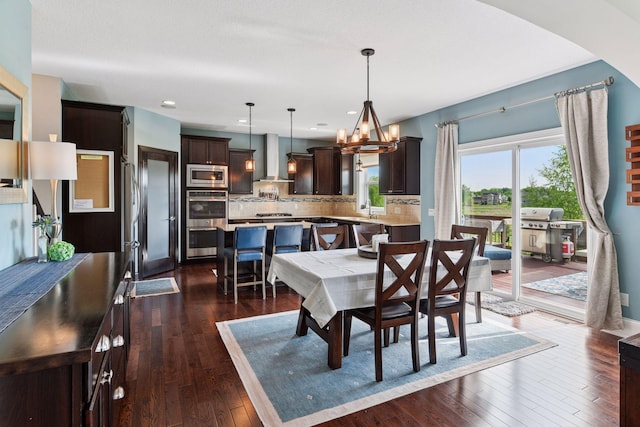3209 Symphony Ct, Chaska, MN 55318 - dining room featuring dark wood-style flooring, a chandelier, and recessed lighting