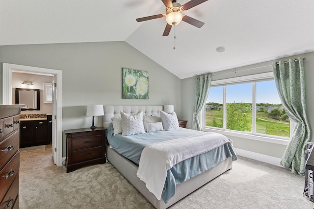 3209 Symphony Ct, Chaska, MN 55318 - bedroom featuring light colored carpet, vaulted ceiling, connected bathroom, and a ceiling fan