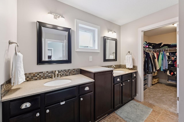 3209 Symphony Ct, Chaska, MN 55318 - bathroom featuring two vanities and a walk in closet