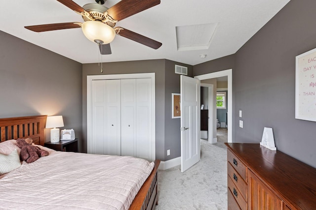 3209 Symphony Ct, Chaska, MN 55318 - bedroom with light colored carpet, a closet, and ceiling fan