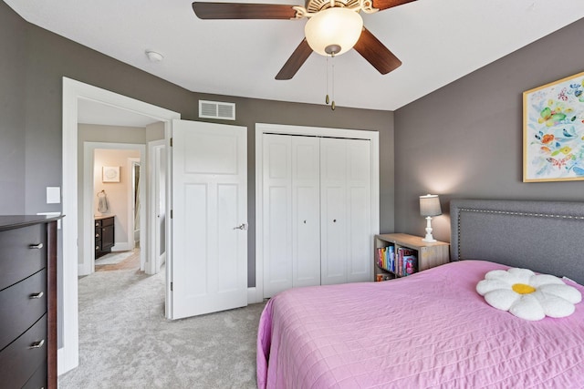 3209 Symphony Ct, Chaska, MN 55318 - bedroom featuring light colored carpet, a closet, and ceiling fan