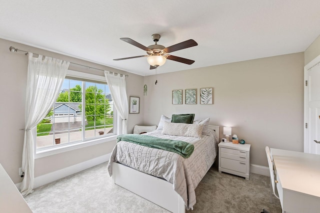 3209 Symphony Ct, Chaska, MN 55318 - carpeted bedroom featuring baseboards and a ceiling fan