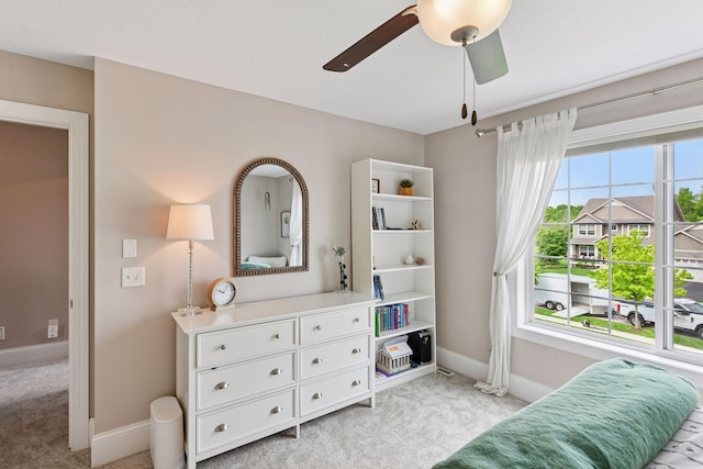 3209 Symphony Ct, Chaska, MN 55318 - living area featuring light carpet and ceiling fan