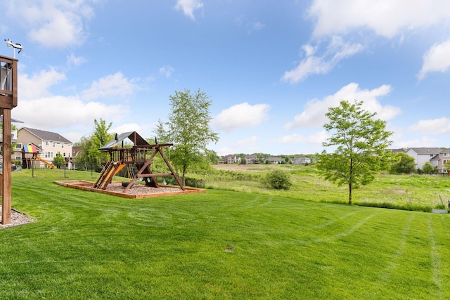 3209 Symphony Ct, Chaska, MN 55318 - view of green lawn with a playground