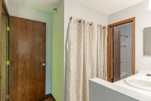 bathroom with vanity and shower / bathtub combination with curtain