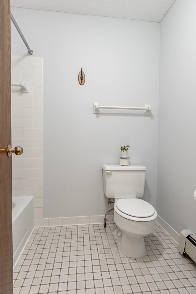 full bathroom with baseboards, tile patterned flooring, a baseboard radiator, and toilet
