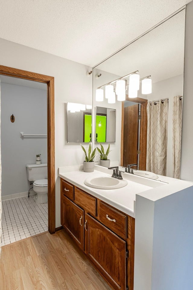 7631 Edinborough Way Unit 5319, Edina, MN 55435 - full bathroom featuring vanity, wood finished floors, and curtained shower
